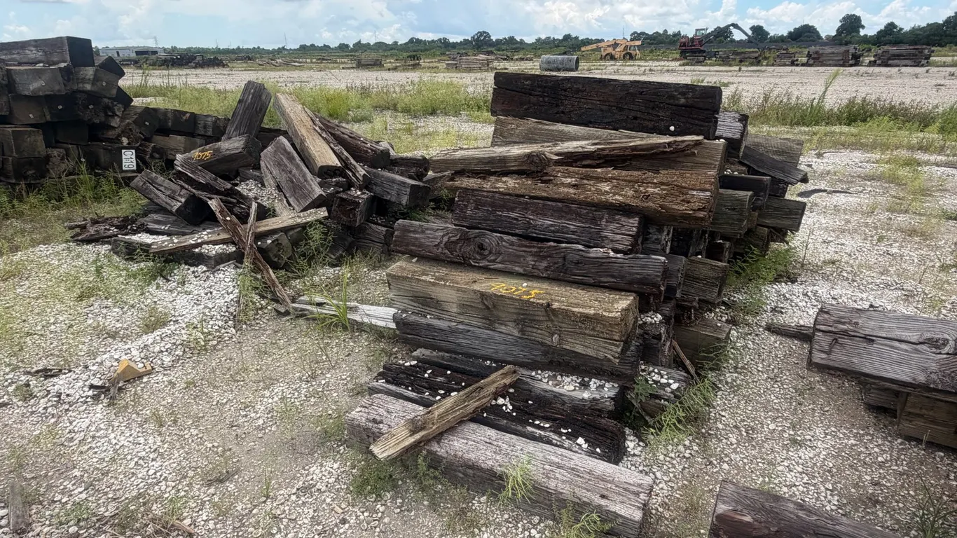 TWO PILES OF RAILROAD TIES