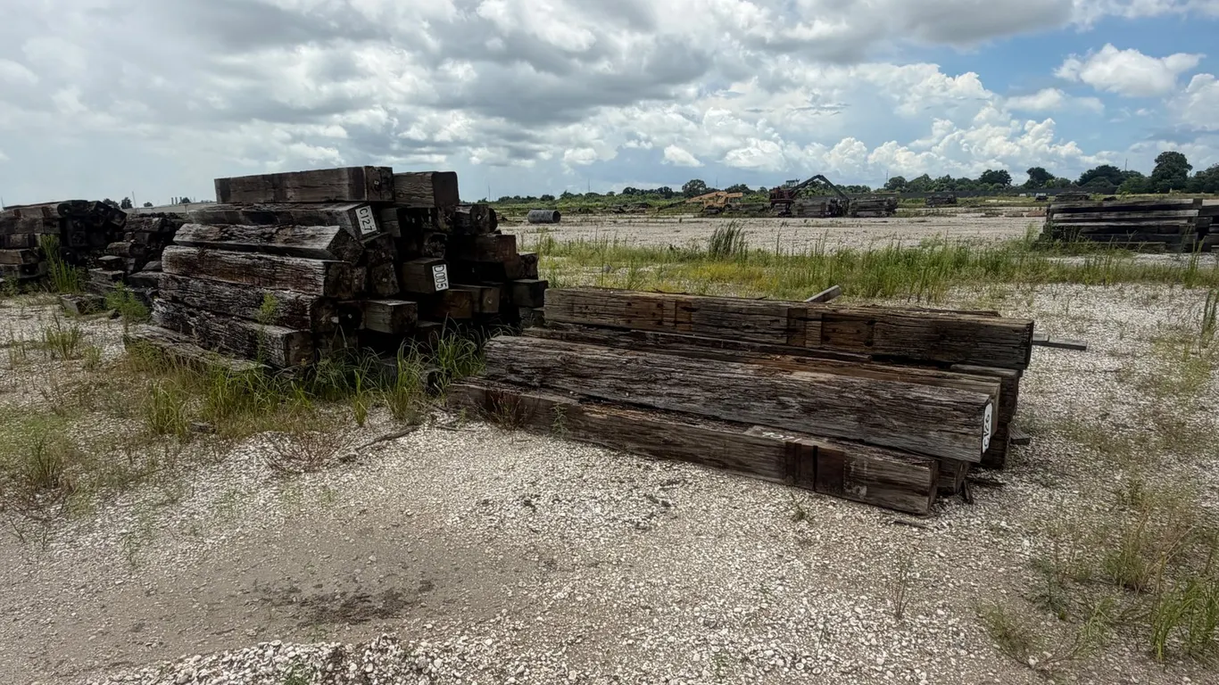 TWO PILES OF RAILROAD TIES