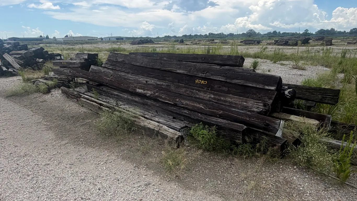TWO PILES OF RAILROAD TIES