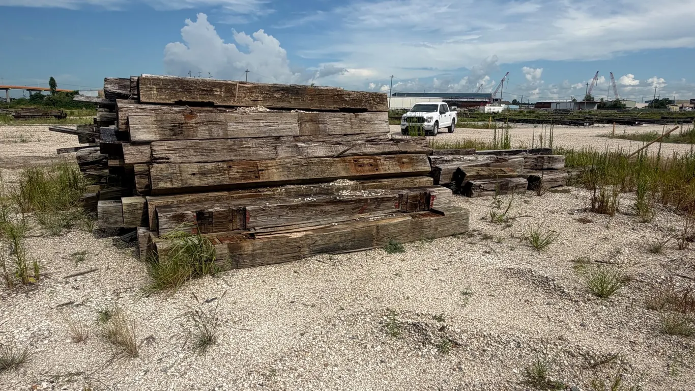 TWO PILES OF RAILROAD TIES