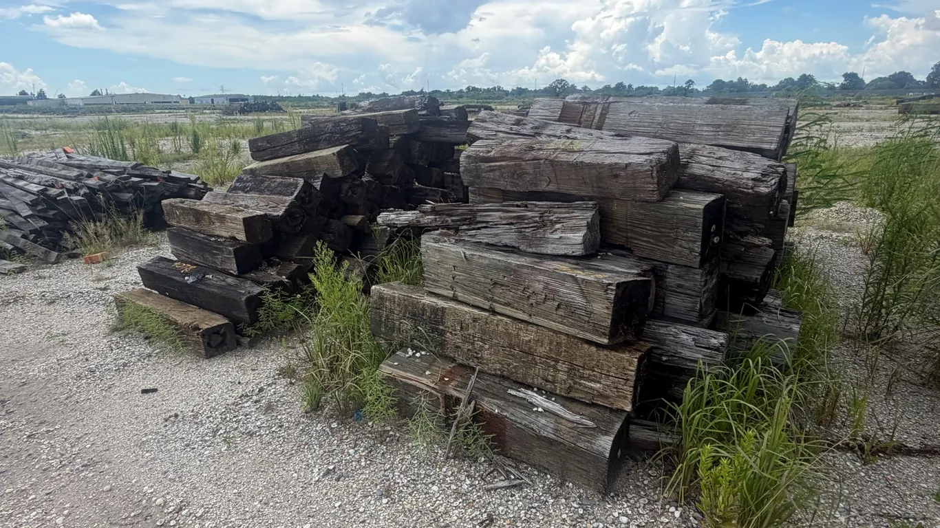 TWO PILES OF RAILROAD TIES