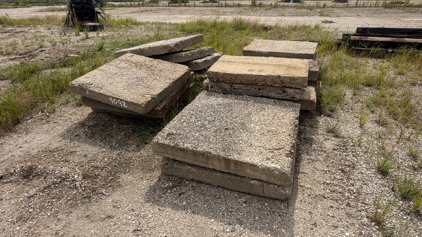 PILE OF CONCRETE PAVERS