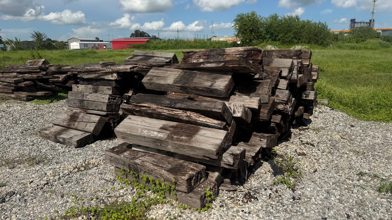 TWO PILES OF RAILROAD TIES