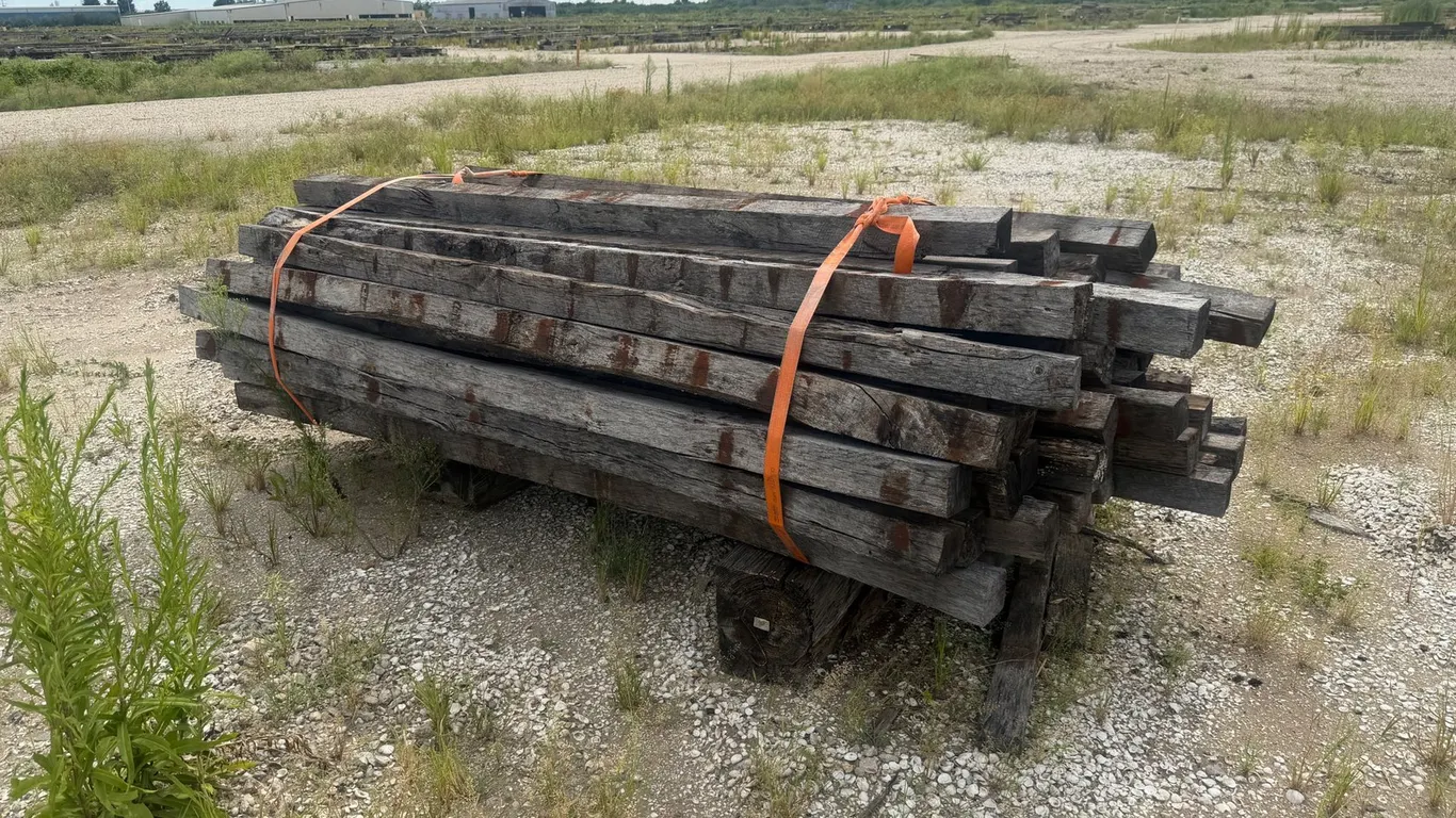 PILE OF RAILROAD TIES AND LUMBER