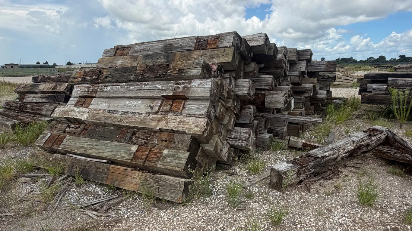 TWO PILES OF RAILROAD TIES