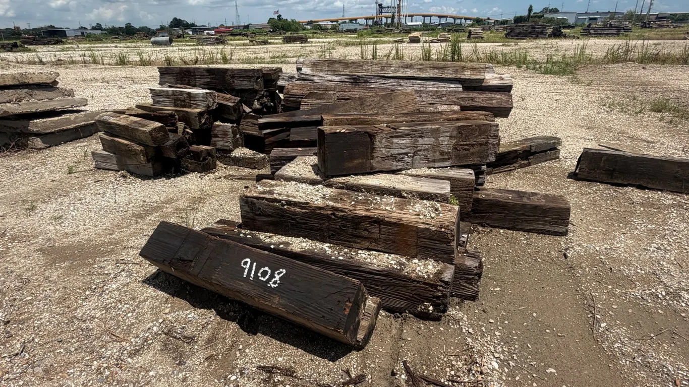 TWO PILES OF RAILROAD TIES