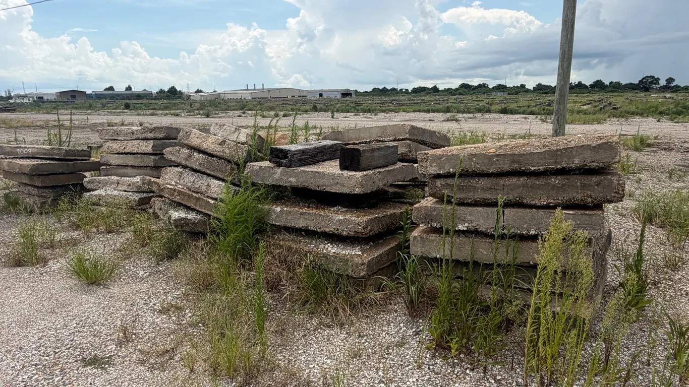 PILE OF CONCRETE PAVERS