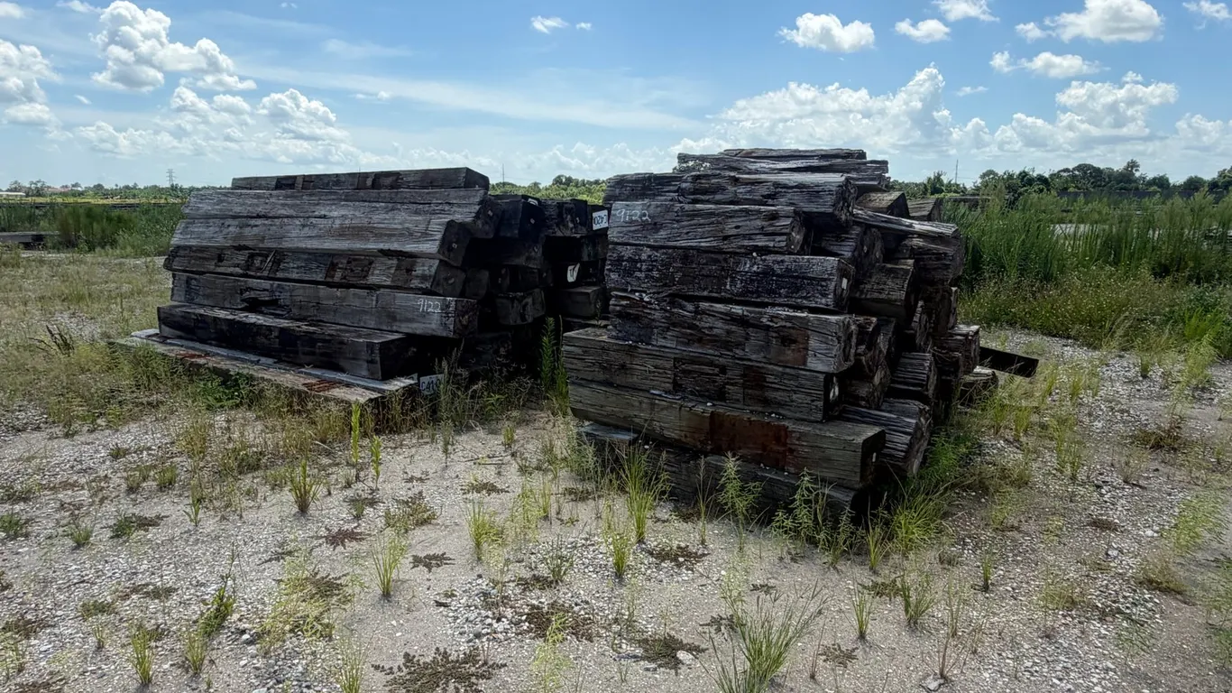 TWO PILES OF RAILROAD TIES