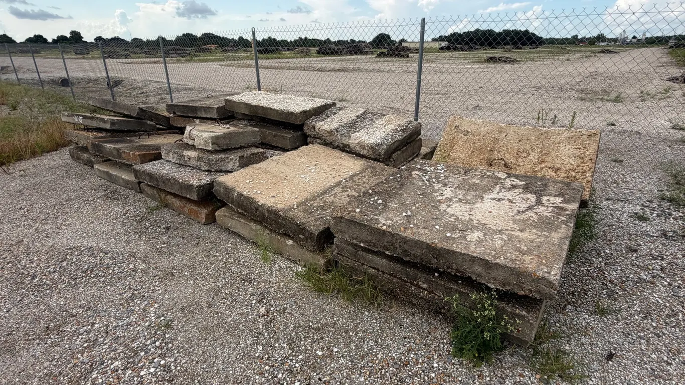 PILE OF CONCRETE PAVERS