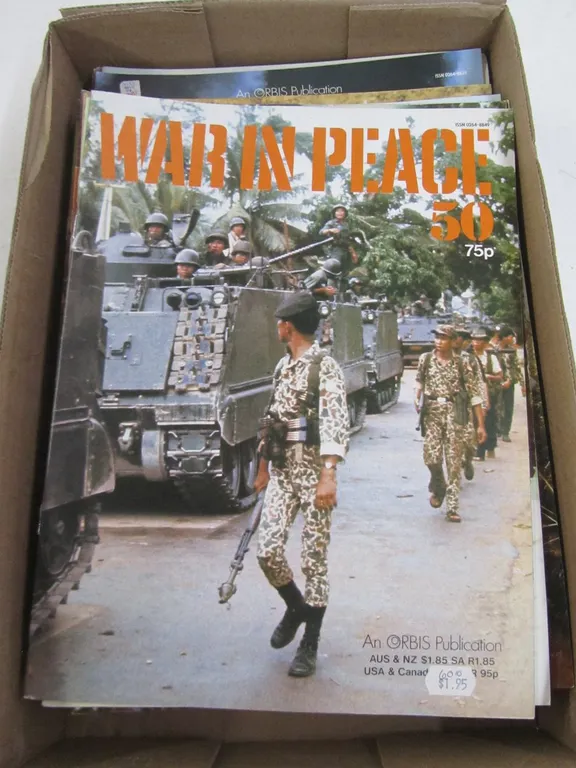 Flat Of Assorted War In Peace Magazines