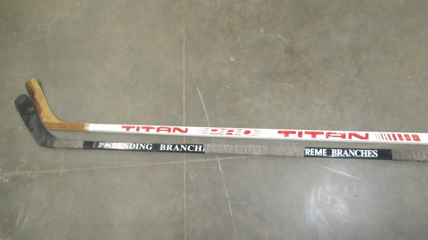 (2) Hockey Sticks