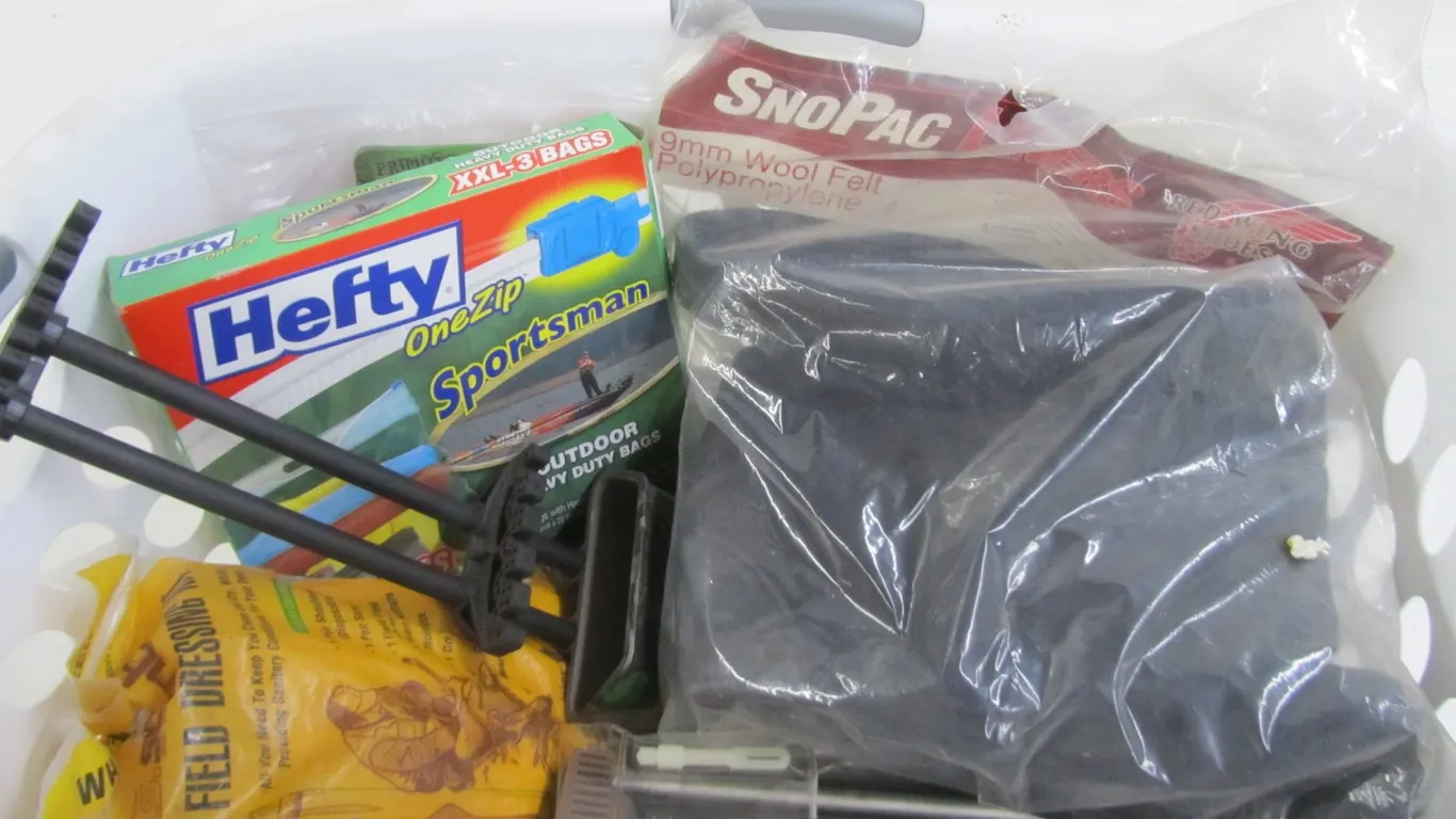 Laundry Basket Full Of Assorted Sporting Goods
