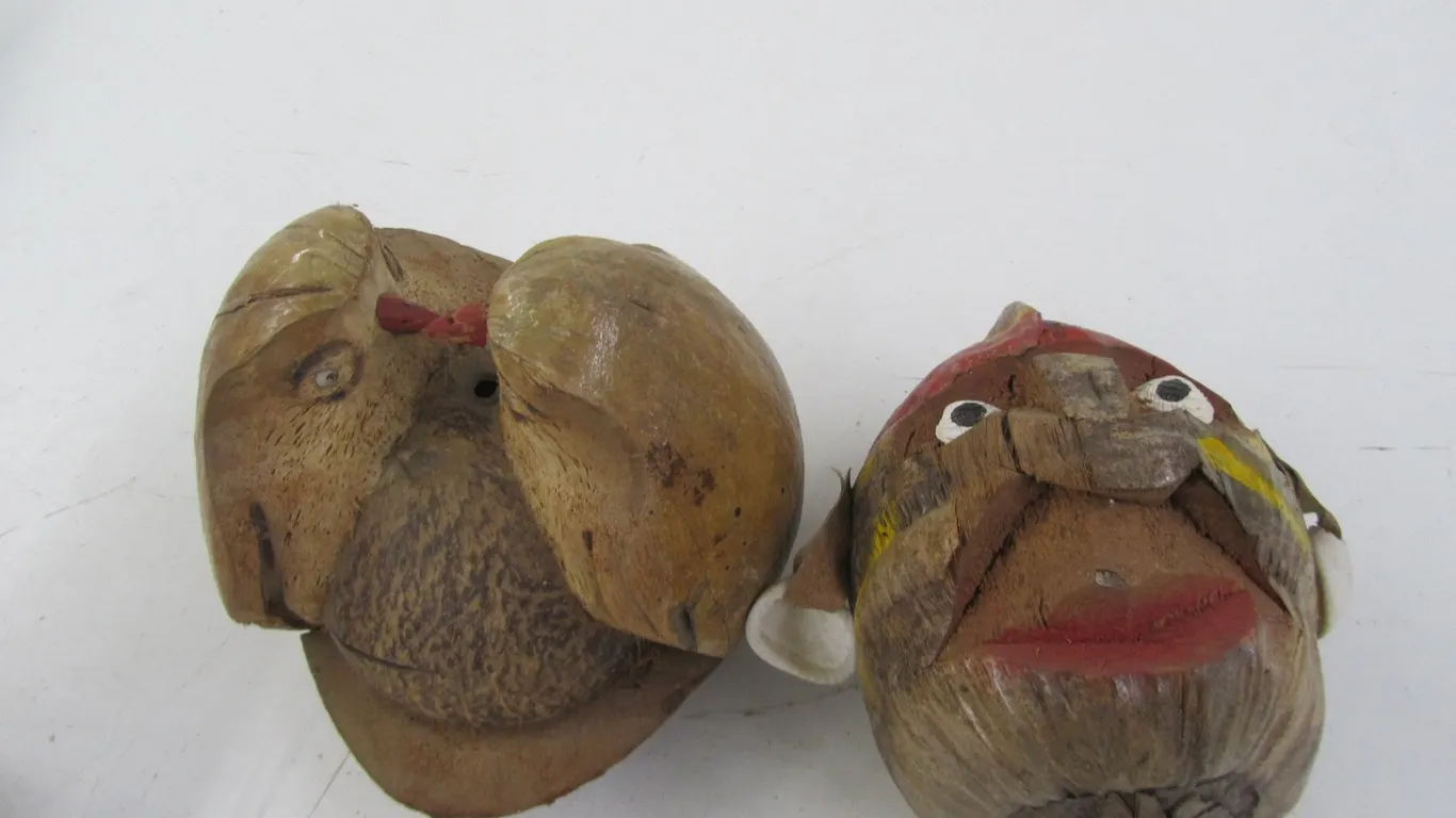 (2) Hand Carved Coconut Decorations