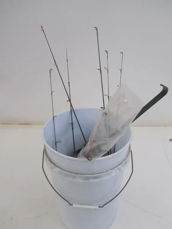 Bucket Full Of Ice Fishing Supplies