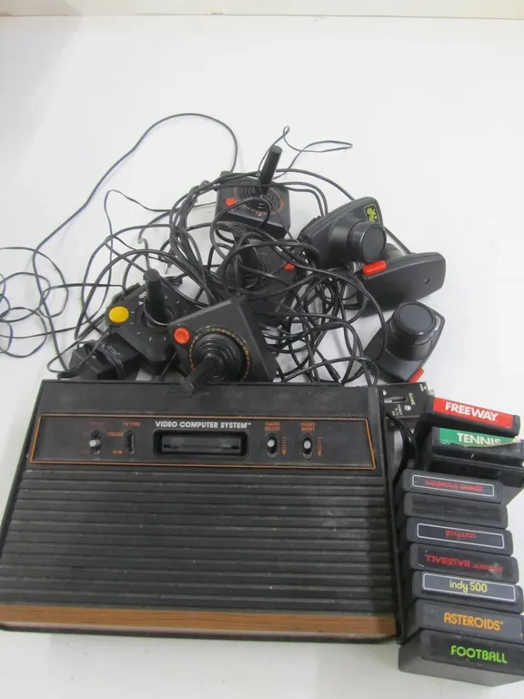 Atari Video Game Console w/Games And Controllers