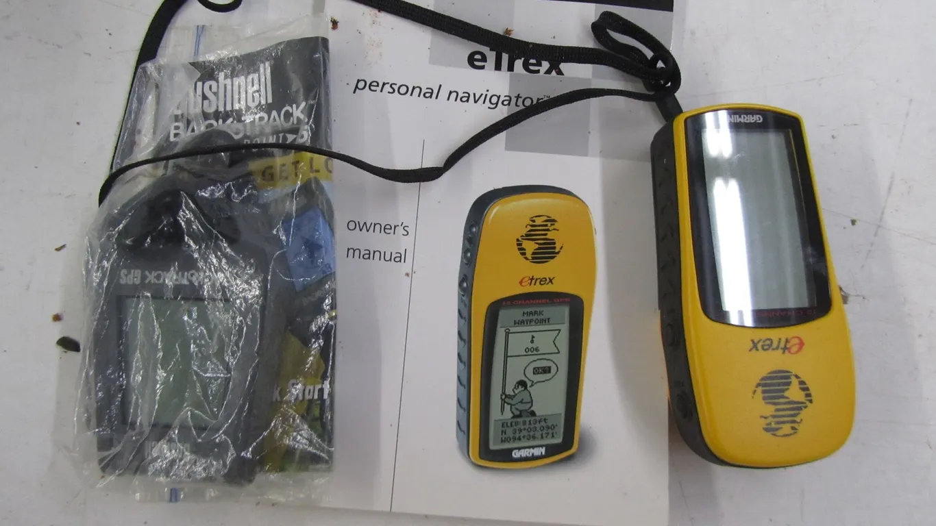 Garmin eTrex 12 Channel GPS And Bushnell Back Track GPS