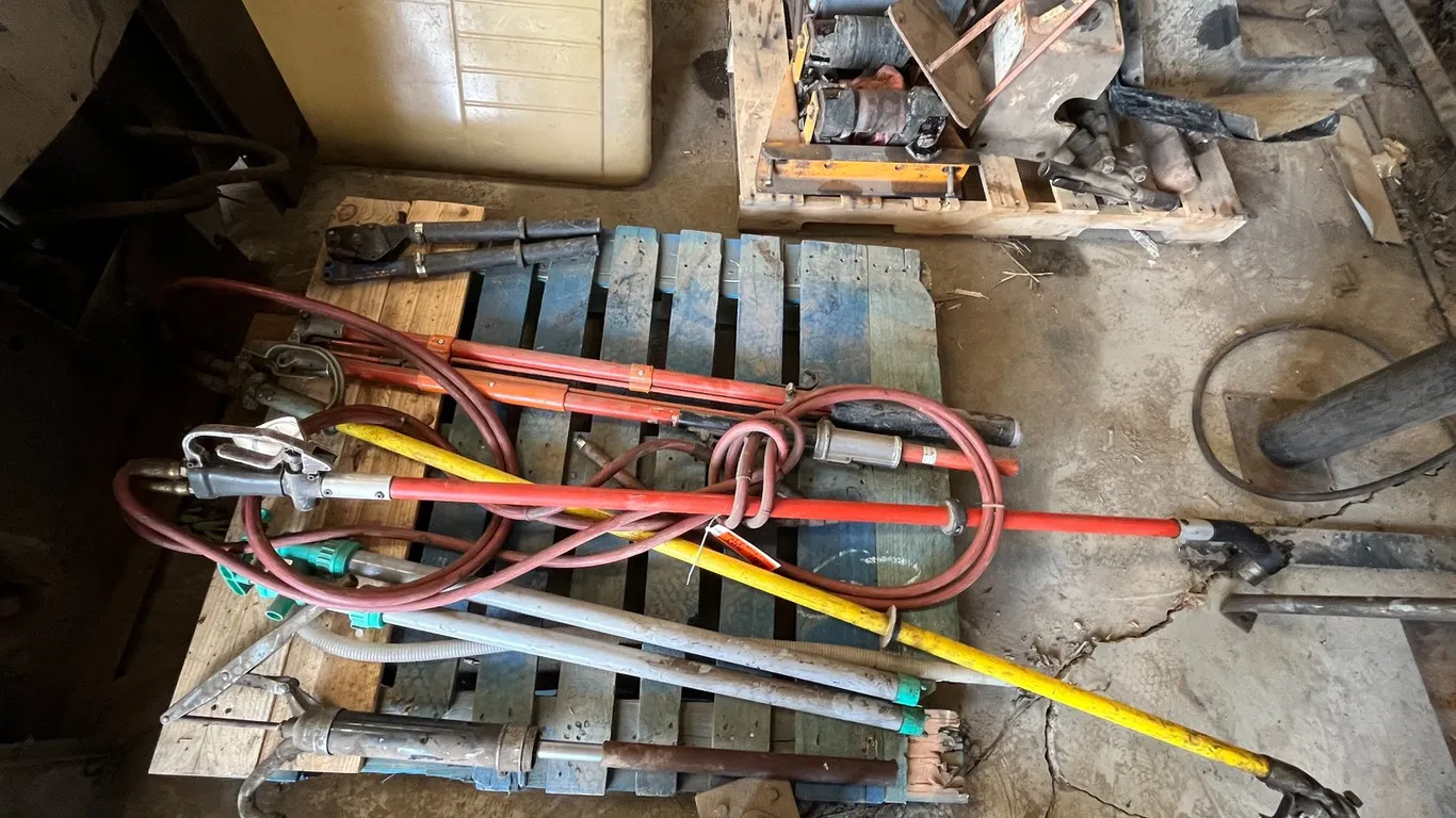 Pallet with (3) Pumps, Extending Pole, and (2) Hydraulic Cutters