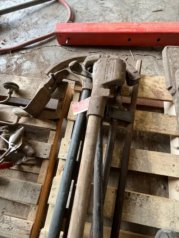 (3) Pipe Benders and (4) Metal Stakes