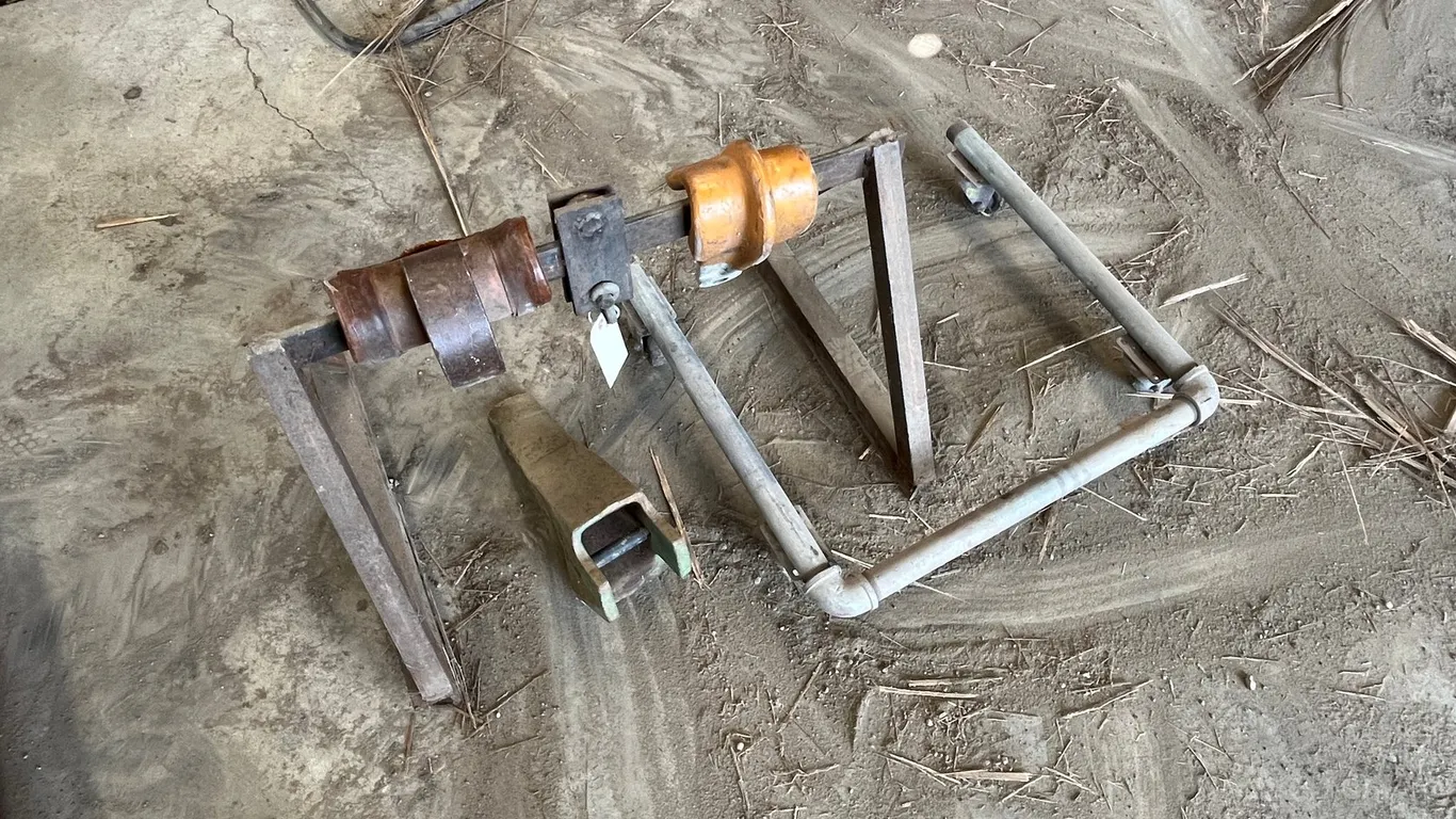 (2) Cable Guides, Digger Tooth, Rack, and Pipe Roller