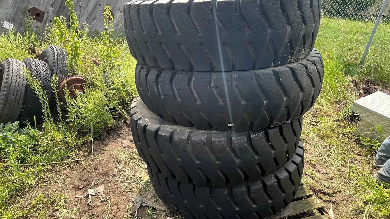 (4) Titan Tires