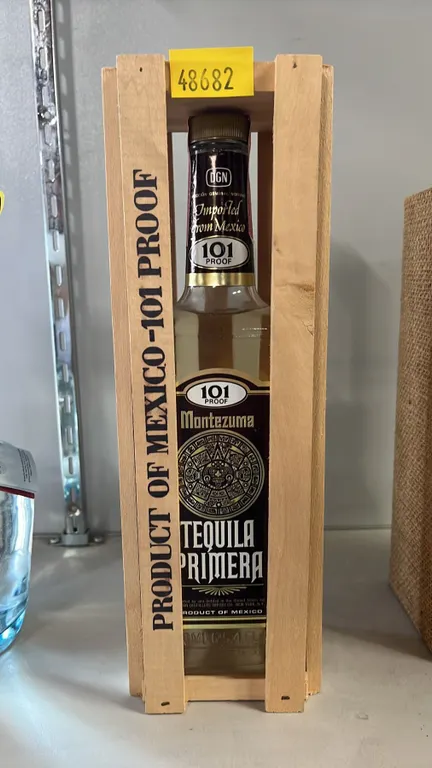 1970S SEALED BOTTLE OF MONTEZUMA PRIMERA TEQUILA