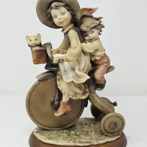 Italian Capodimonte Resin Boy & Girl on Bike