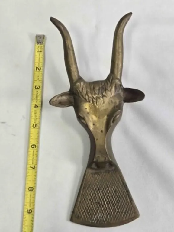 Brass cow head book jack, 9" long