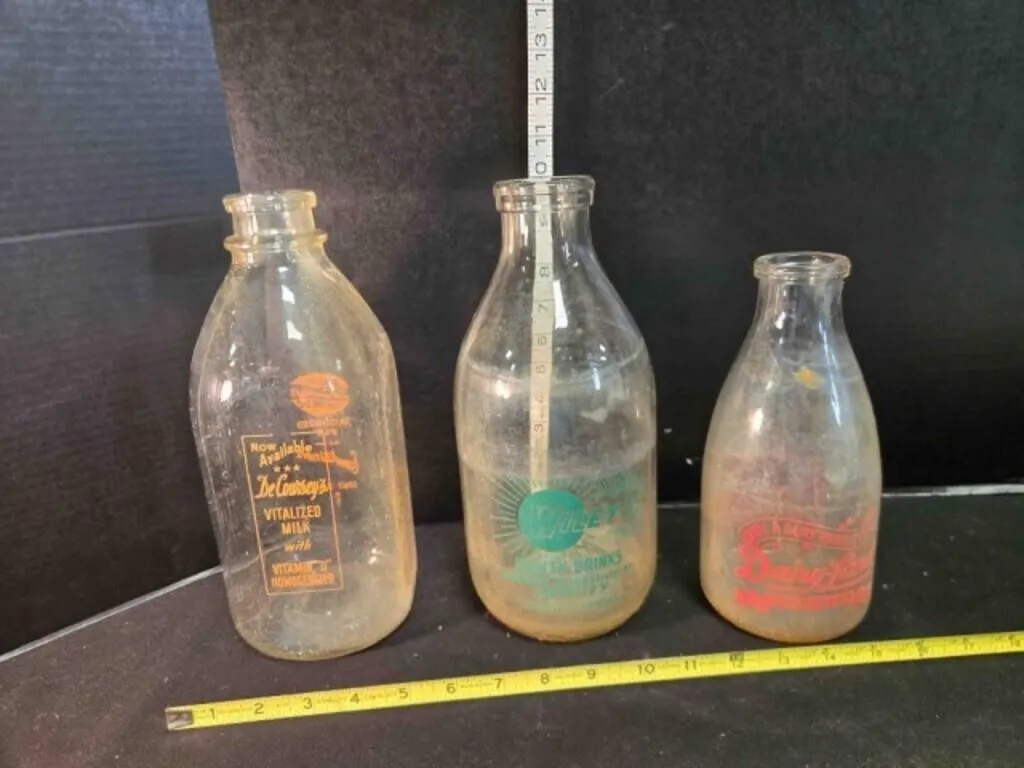 3 vintage milk bottles