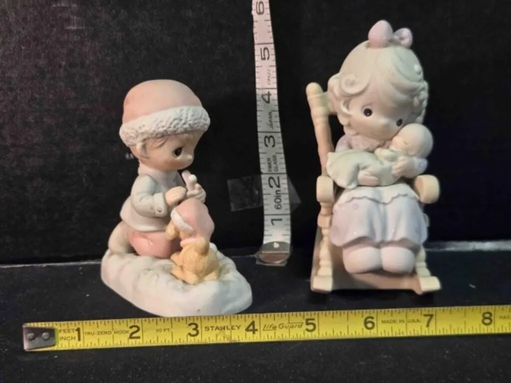 2 Precious Moments figurines
