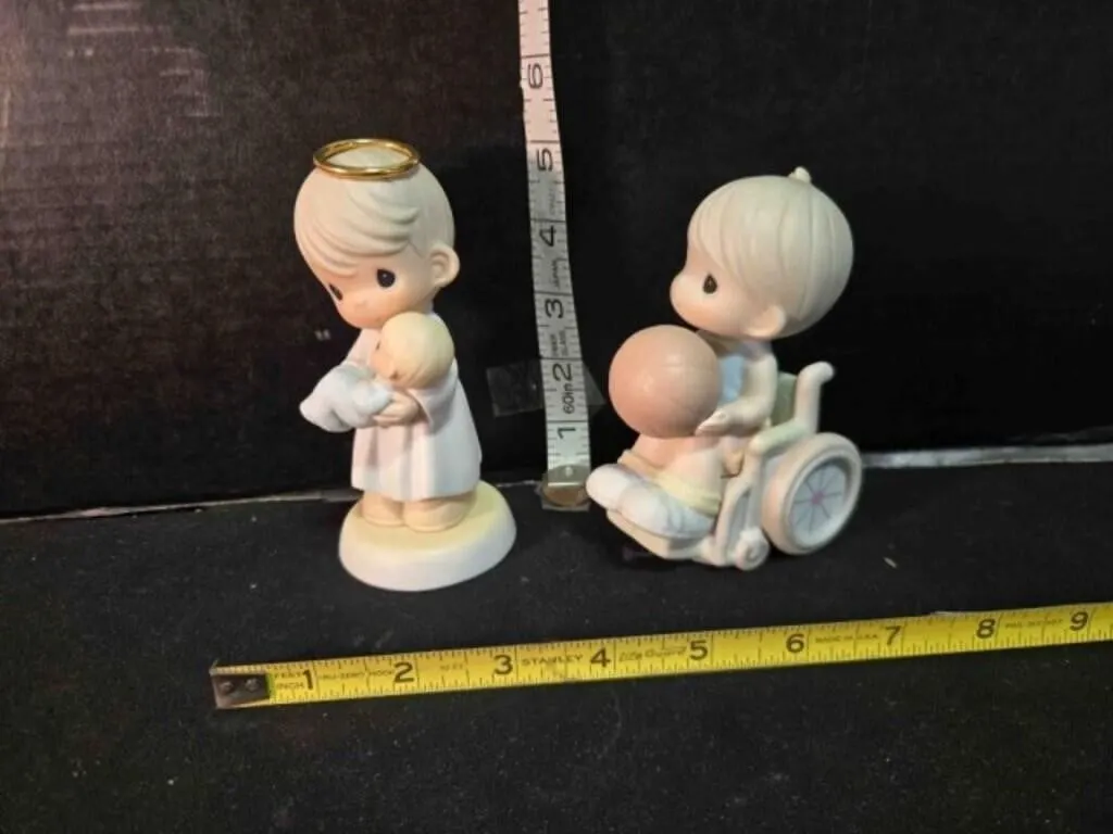 2 Precious Moments figurines