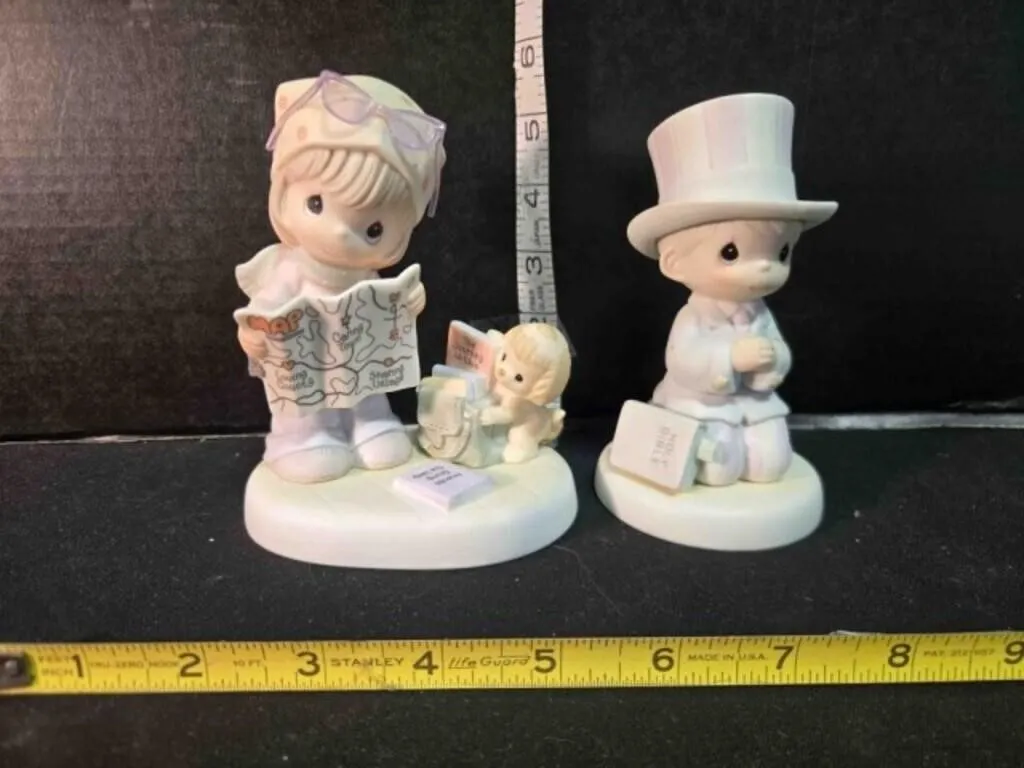 2 Precious Moments figurines