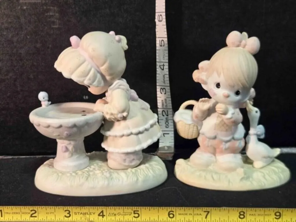 2 Precious Moments figurines