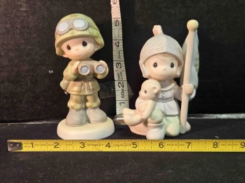 2 Precious Moments figurines