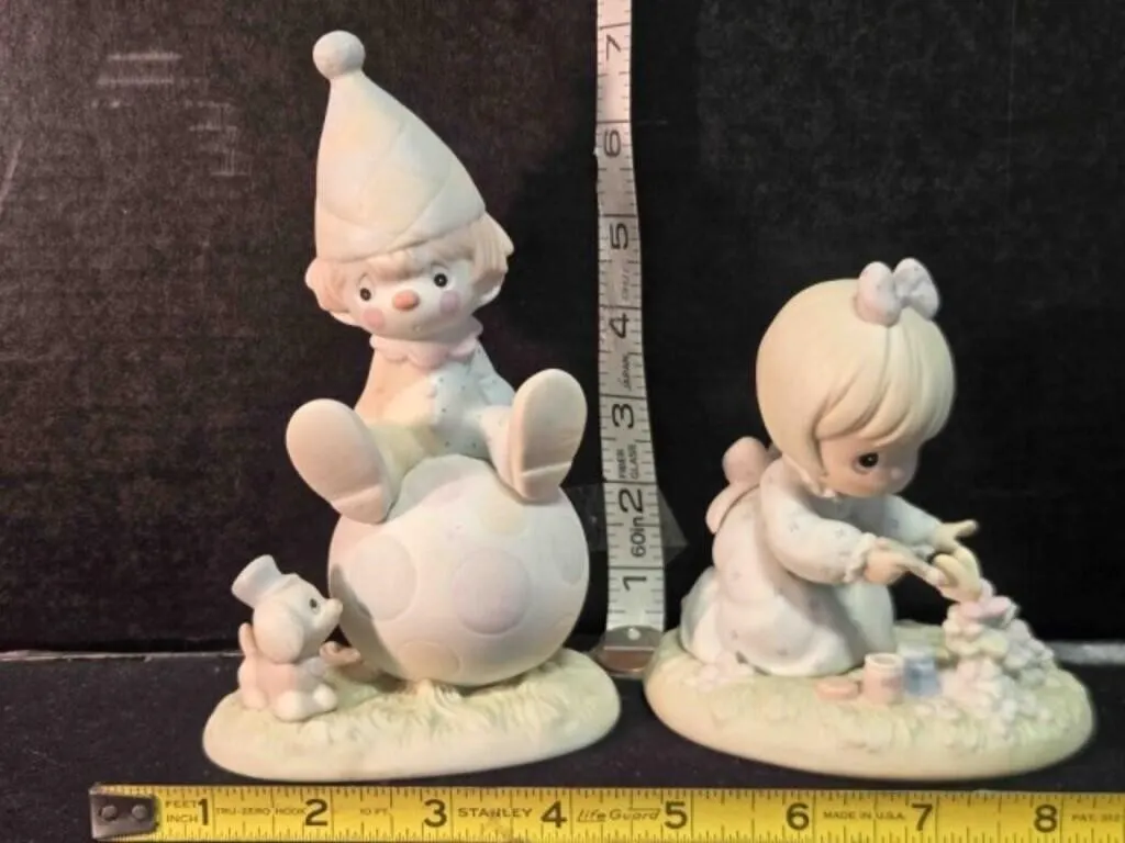 2 Precious Moments figurines
