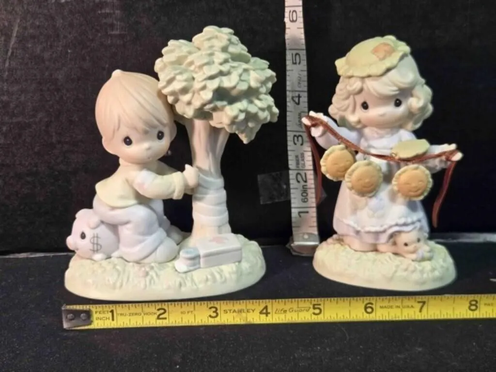 2 Precious Moments figurines