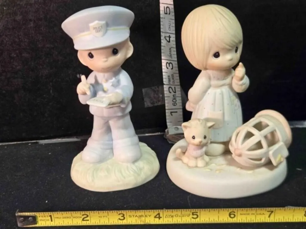 2 Precious Moments figurines