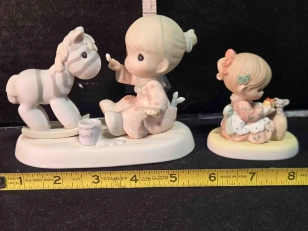 2 Precious Moments figurines