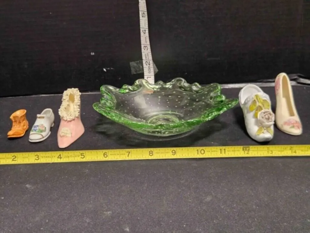 Green glass dish, 5 porcelain shoes