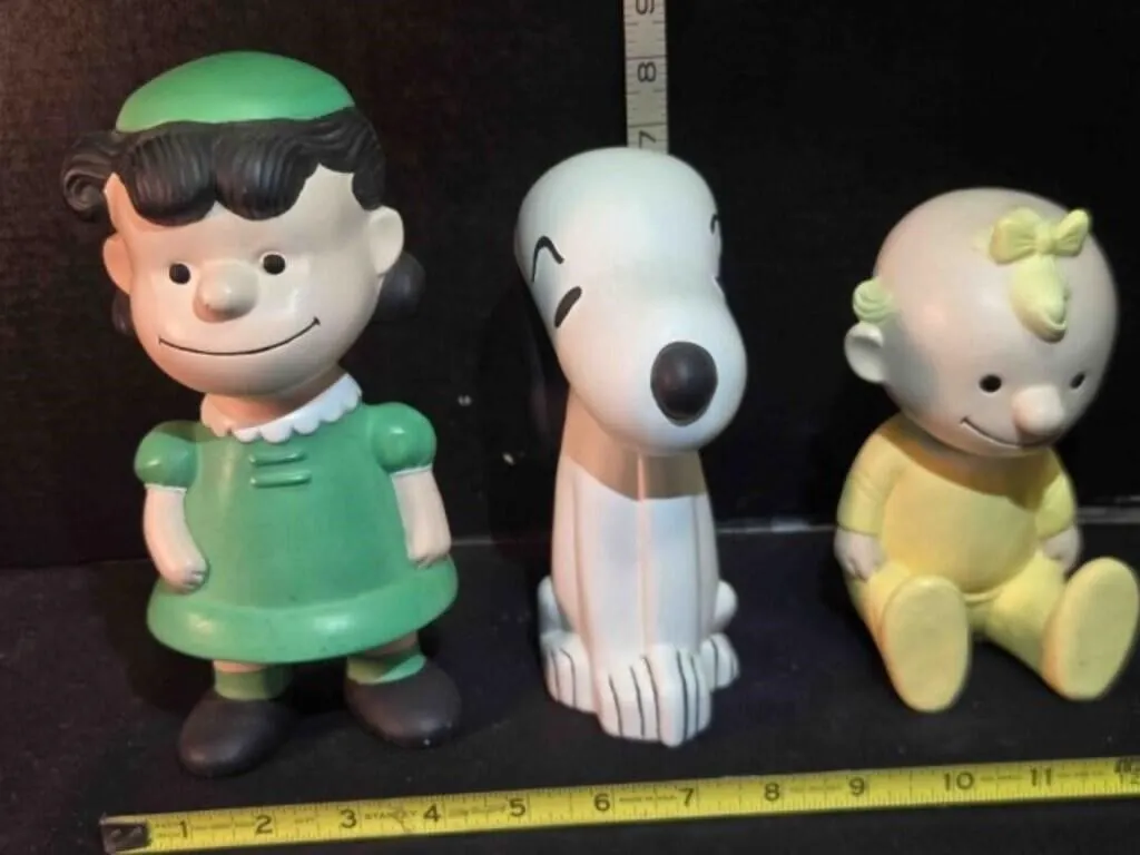 3 Peanuts figures; Lucy 8�", Snoopy 7"