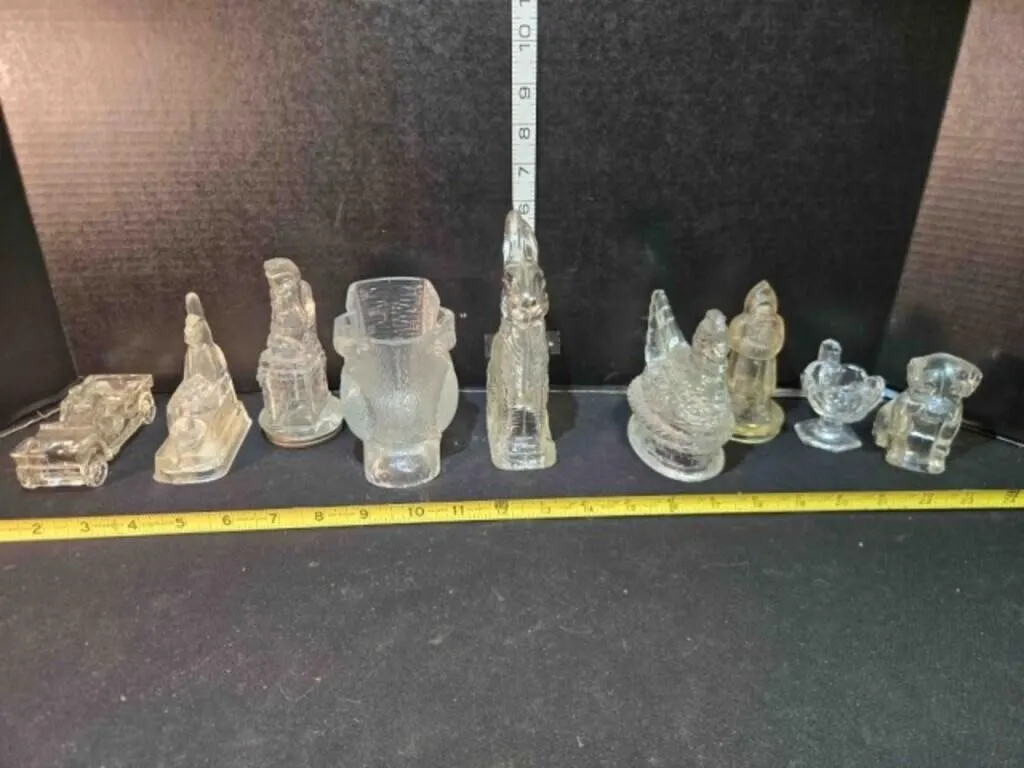 9 glass figurines; 2 Santas,glass candy container