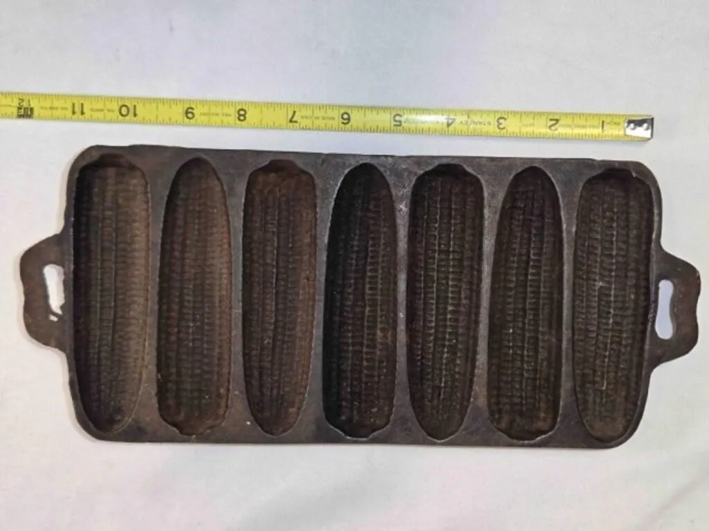 Vintage cast iron corn muffin pan, 11" across
