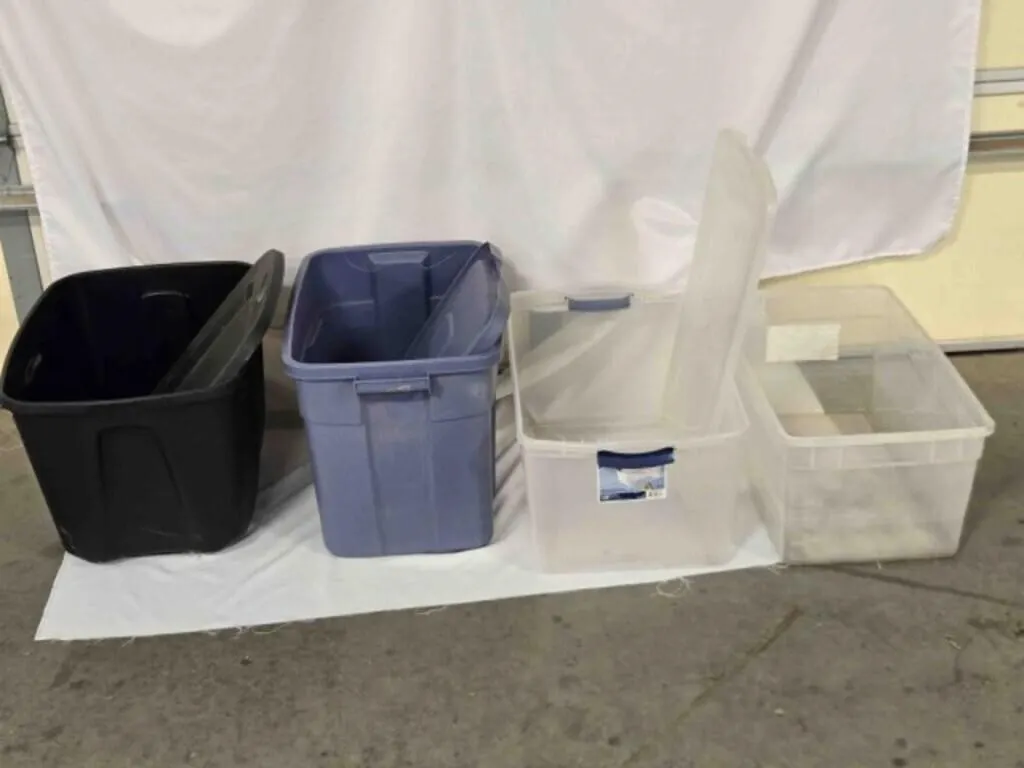 4 storage bins, 3 w/lids; 18 gal, 22 qt, 54 qt.