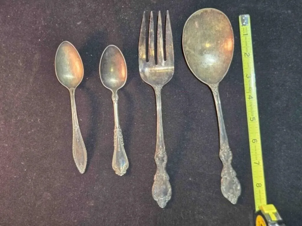 4 pieces Wm. Rogers silver plated flatware