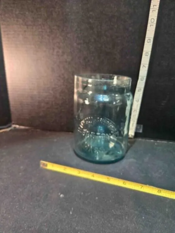 6" glass spouted jar marked Pettingell Andrews