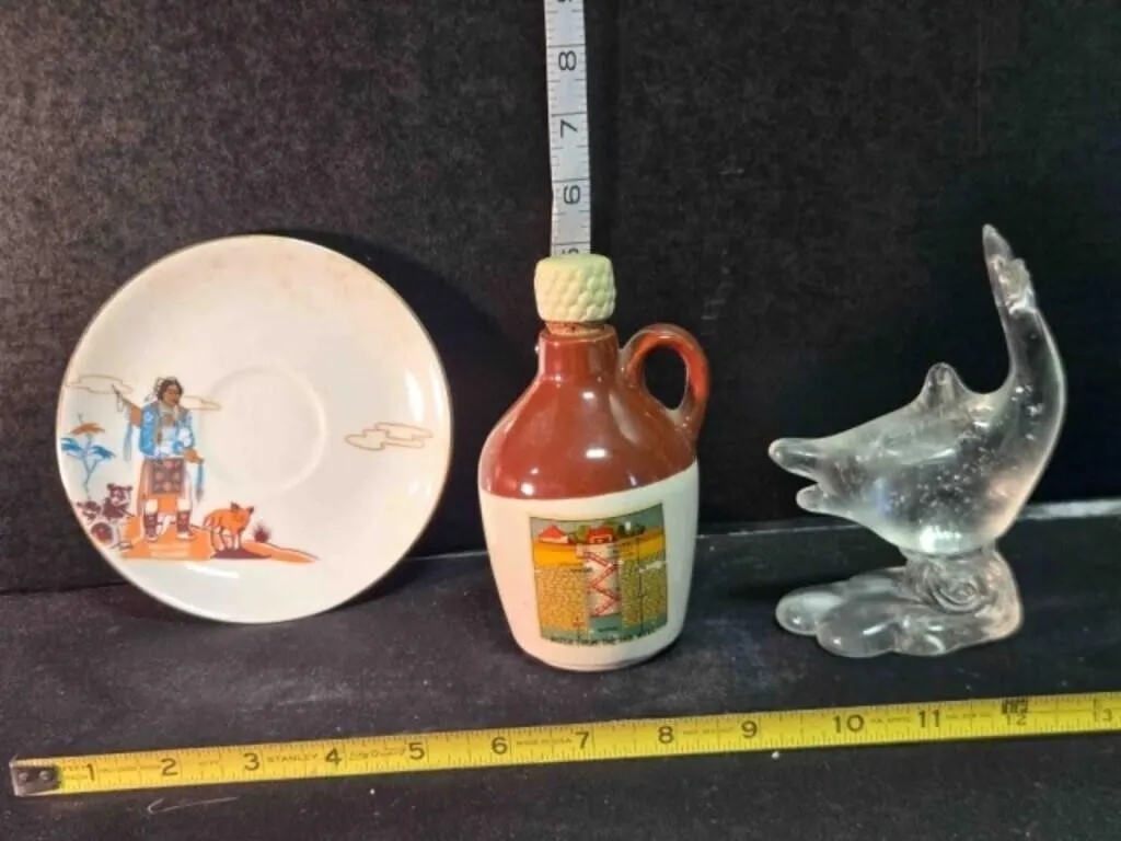 Brown jug, glass dolphin, American Indian saucer
