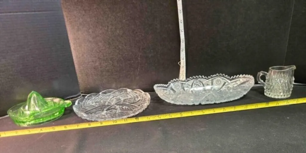 Cut glass; 2 relish trays, juicer, pitcher