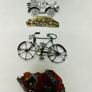 3 Car Brooches, 1 Bicycle brooch-wheels turn on