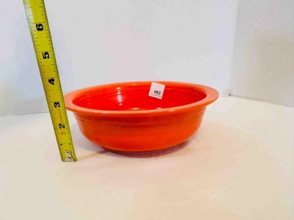 Fiesta Medium Orange Bowl 8.5" edge has flea bite