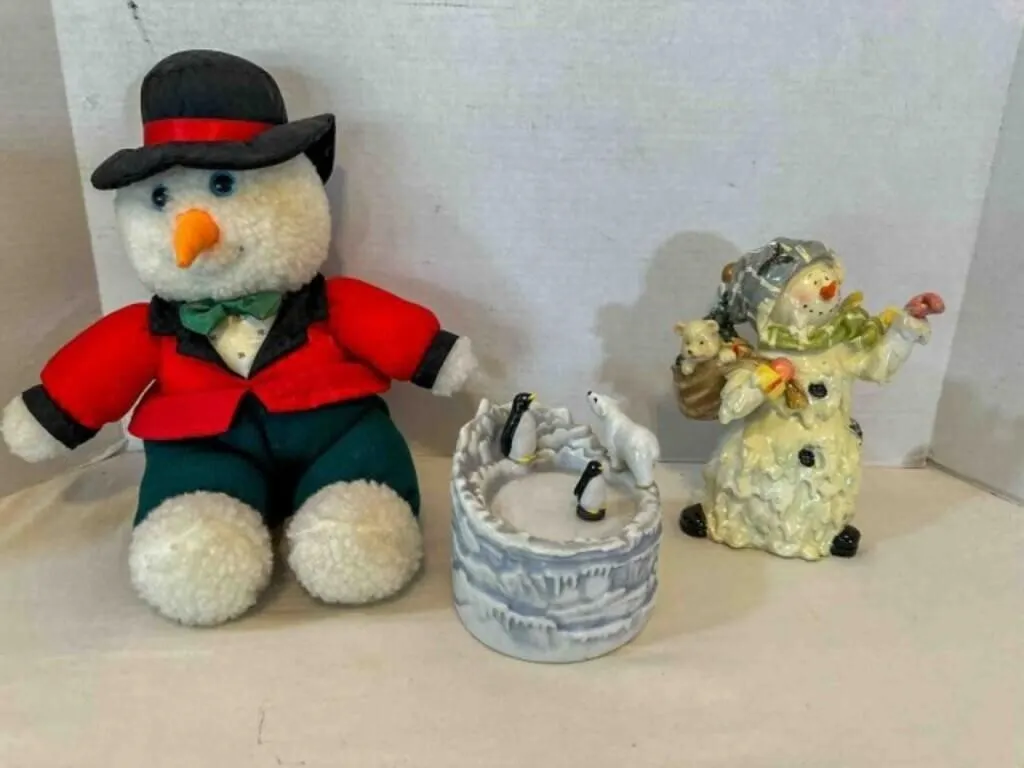 Dancing Penguins Music box plays Life is A Cabaret