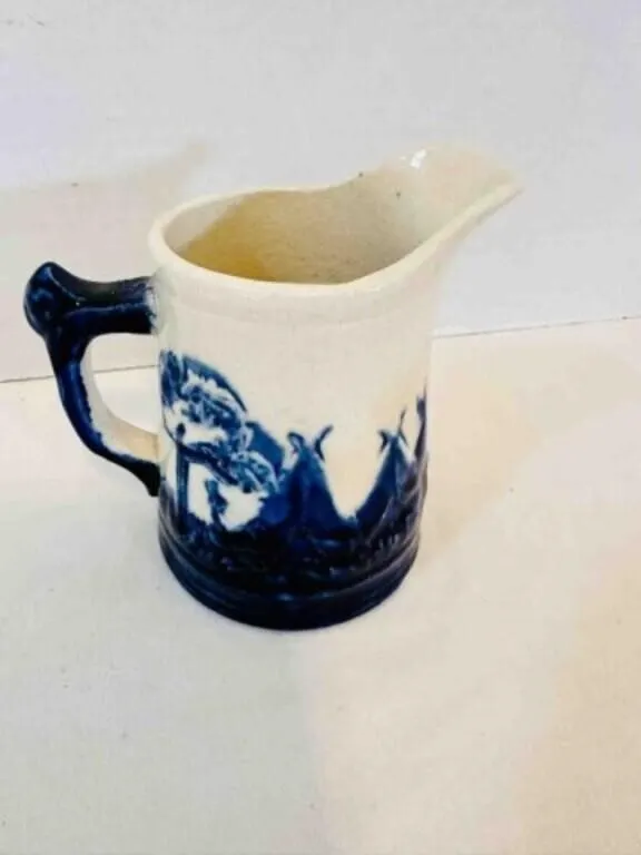 Old Sleepy Eye Pitcher 3.5" has some cracks, Monmo